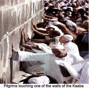 hajj-pilgrims-touch-wall-of-kaaba.jpg