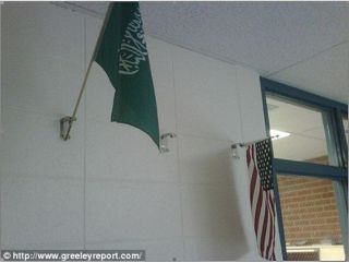Saudi flag placed above American flag in Colorado school